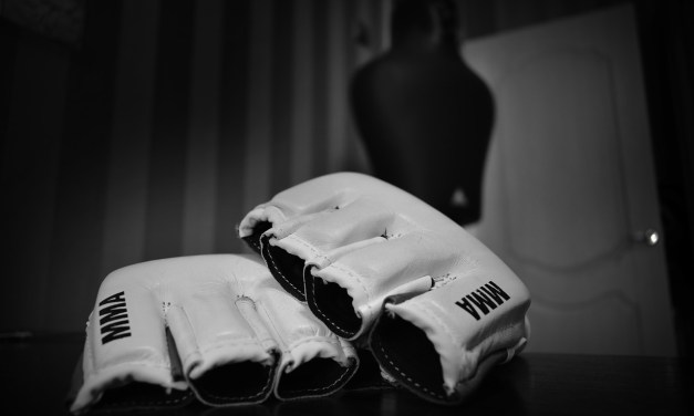 Who holds the record for the most consecutive title defenses in MMA?